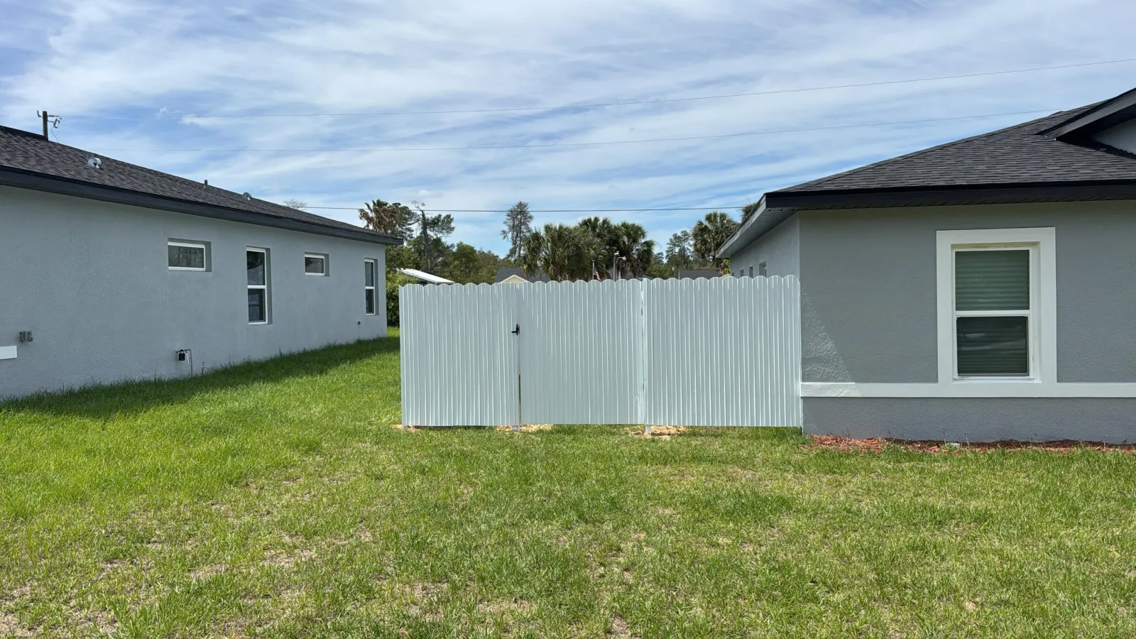Durafence, white gate by Crystalline Home Improvement in Central Florida