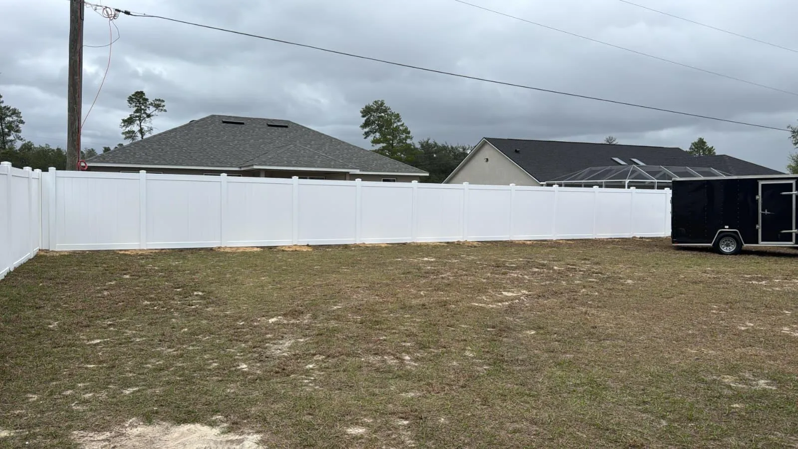 Vinyl privacy, white gate by Crystalline Home Improvement in Central Florida